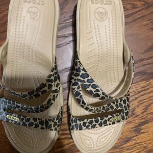 CROCS Tan and Black Animal Print Sandals